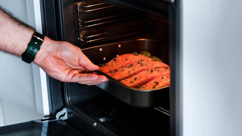 Cooking fish can leave some bad odors in the oven.