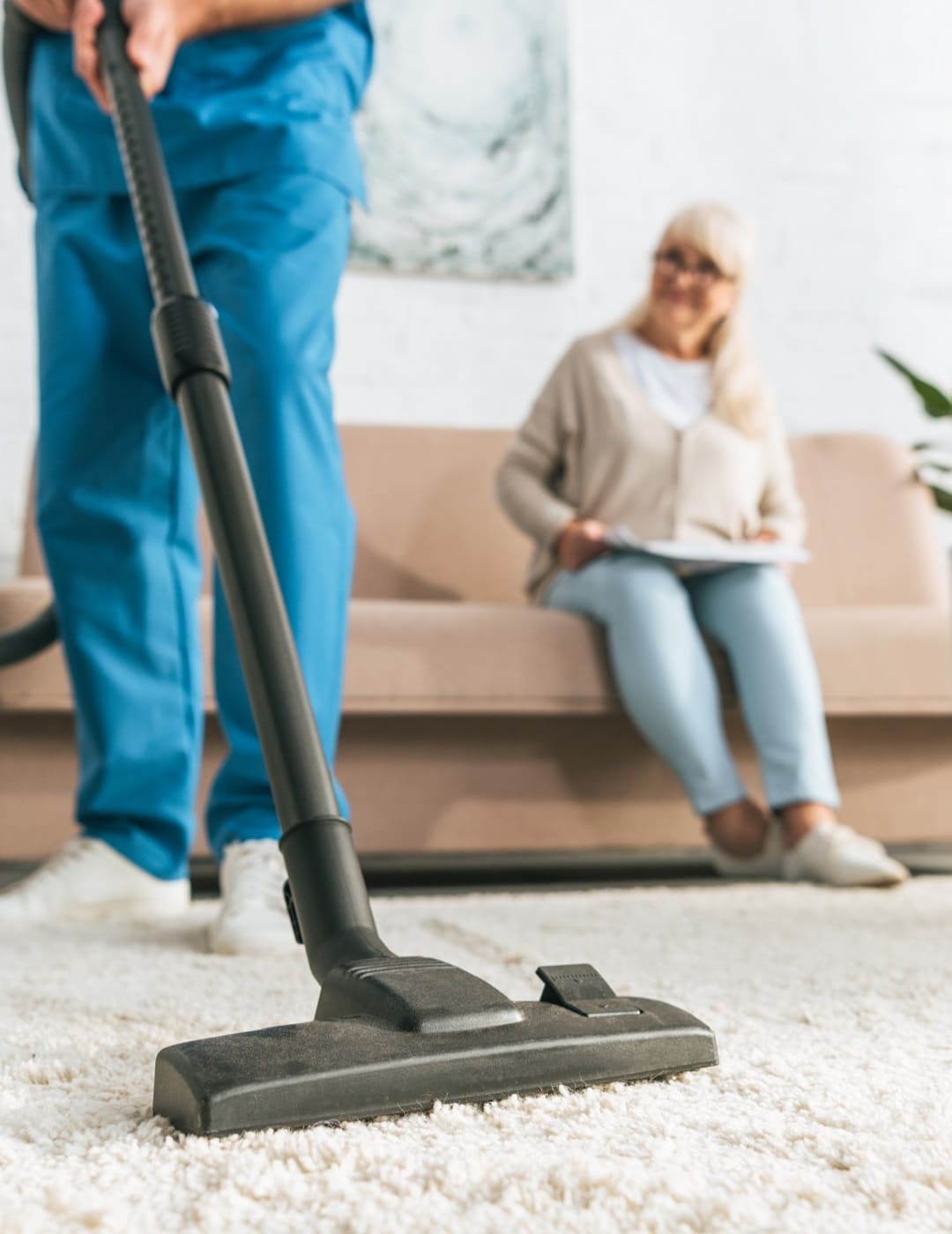 Carpet cleaner performing NDIS service